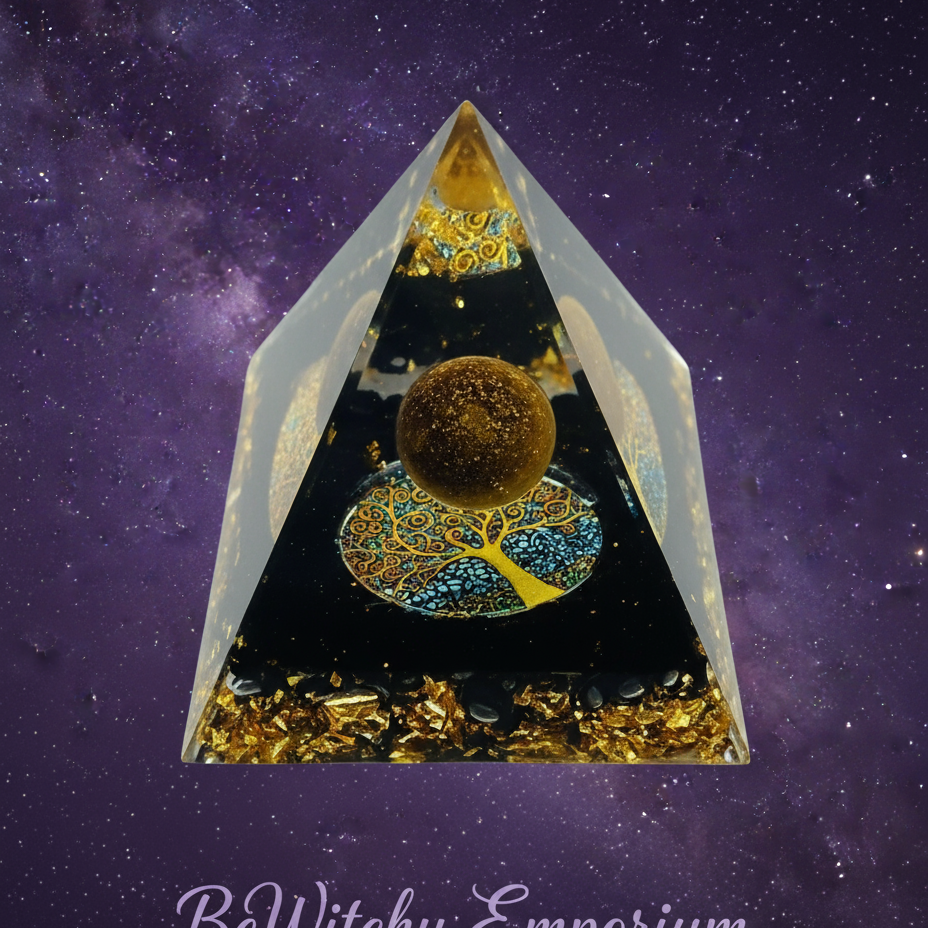 Exact black and gold orgone pyramid with cosmic mystical styling and BeWitchy Emporium watermark