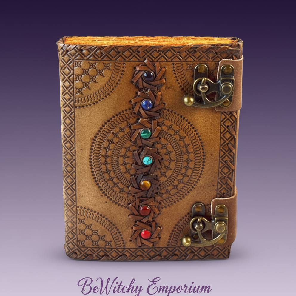 Exact brown leather chakra journal with spiral design with clean professional styling and BeWitchy Emporium watermark