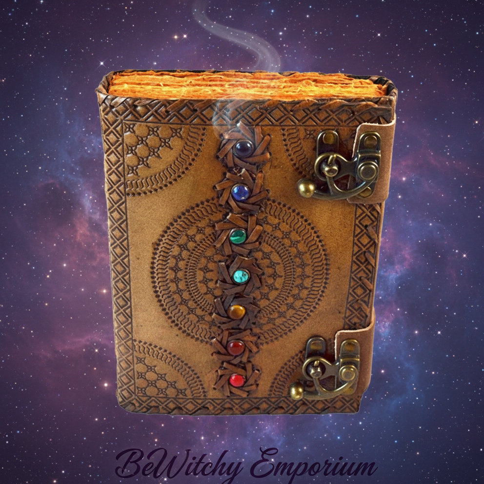 Exact brown leather chakra journal with spiral design with cosmic mystical styling and BeWitchy Emporium watermark