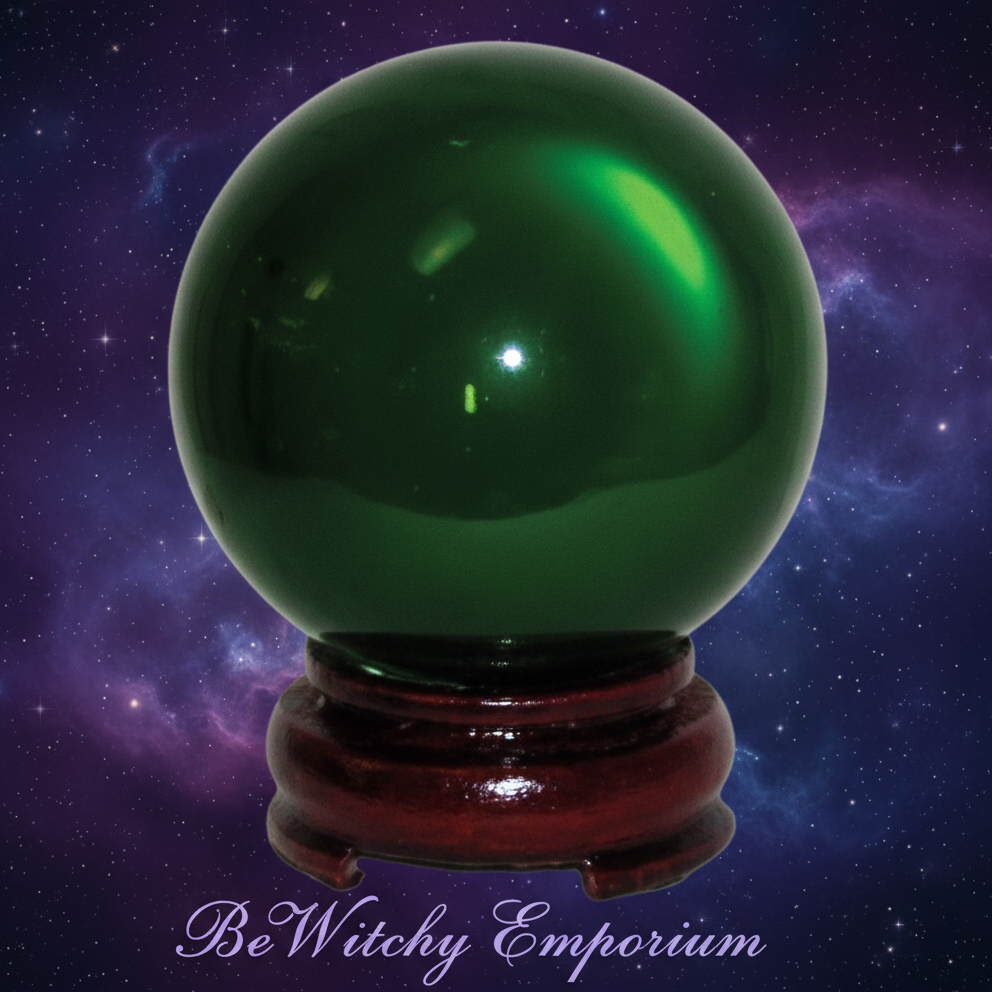 Exact green glass crystal ball with cosmic mystical styling and BeWitchy Emporium watermark