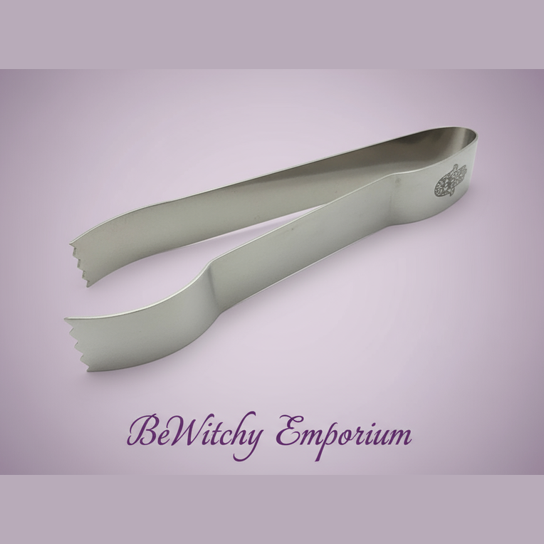 Exact silver candle wick trimmer tongs with clean professional styling and BeWitchy Emporium watermark