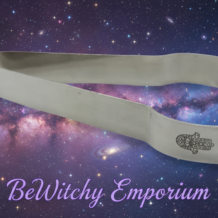 Exact silver candle wick trimmer tongs with cosmic mystical styling and BeWitchy Emporium watermark